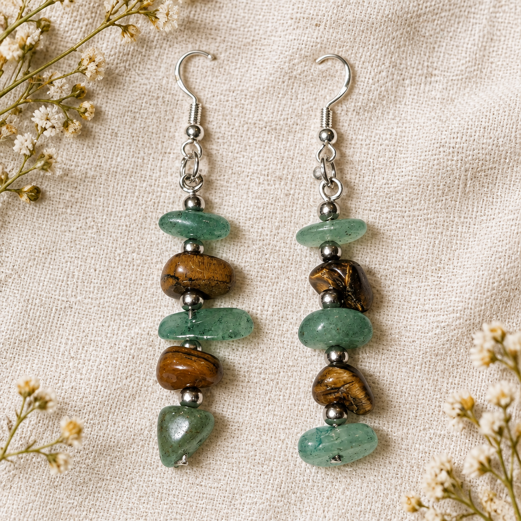Earrings on linen with wildflowers