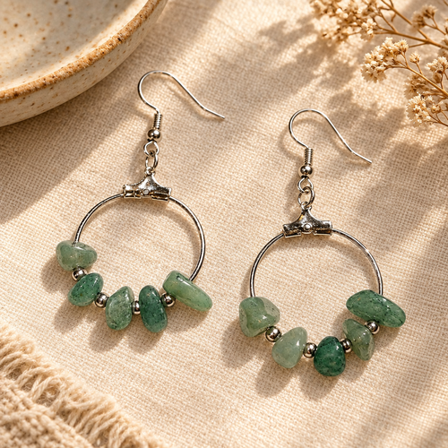 Earrings styled on ivory linen