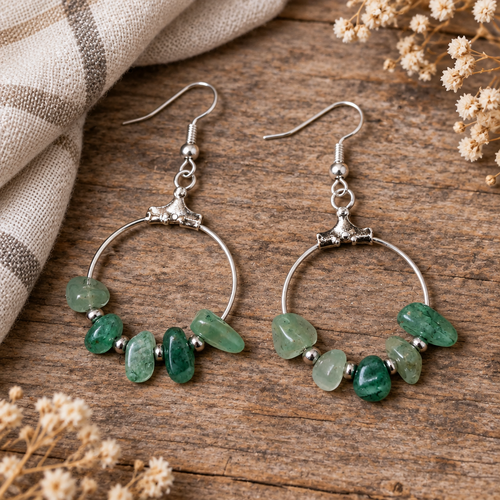 Earrings styled on natural wood