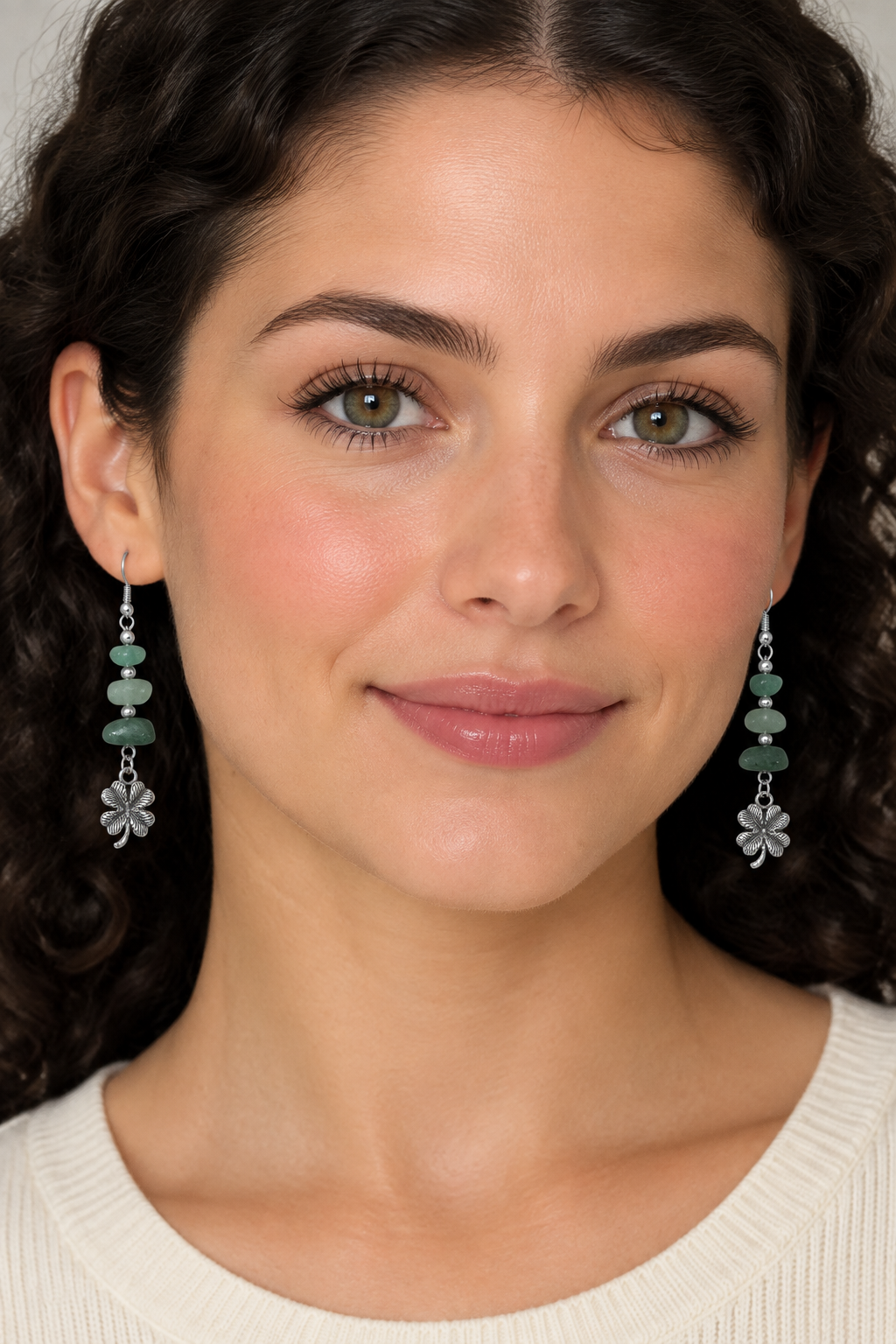 Model wearing aventurine clover earrings