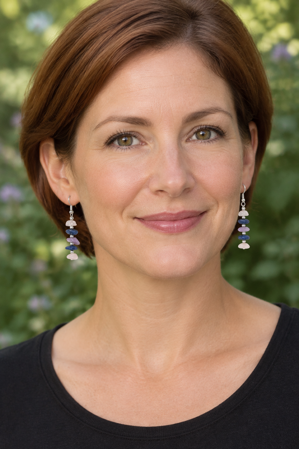 Shorter earrings on model with auburn hair